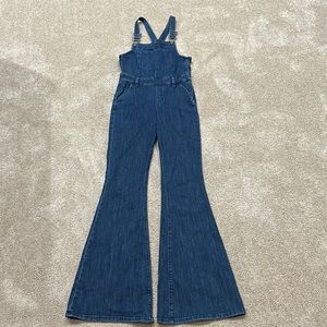 Express stretch jeans flare bottom overalls. So cute!! Only worn once.